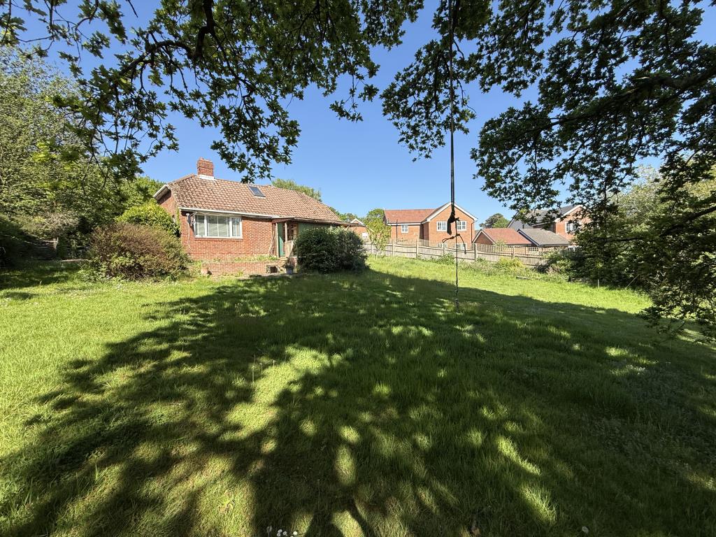 Lot: 112 - VACANT THREE-BEDROOM BUNGALOW ON PLOT OF 0.3 ACRES - View of bungalow from garden